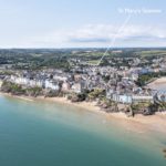 Aerial view of the coastal town of Tenby, with a line pointing to a building identified as St Mary’s Seaview, a Christian holiday flat.